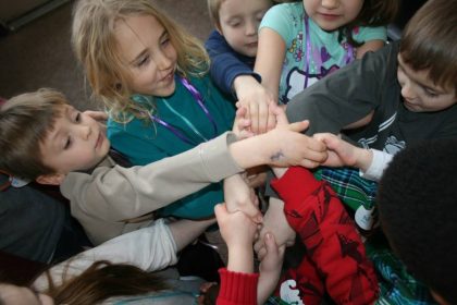 Kids holding hands